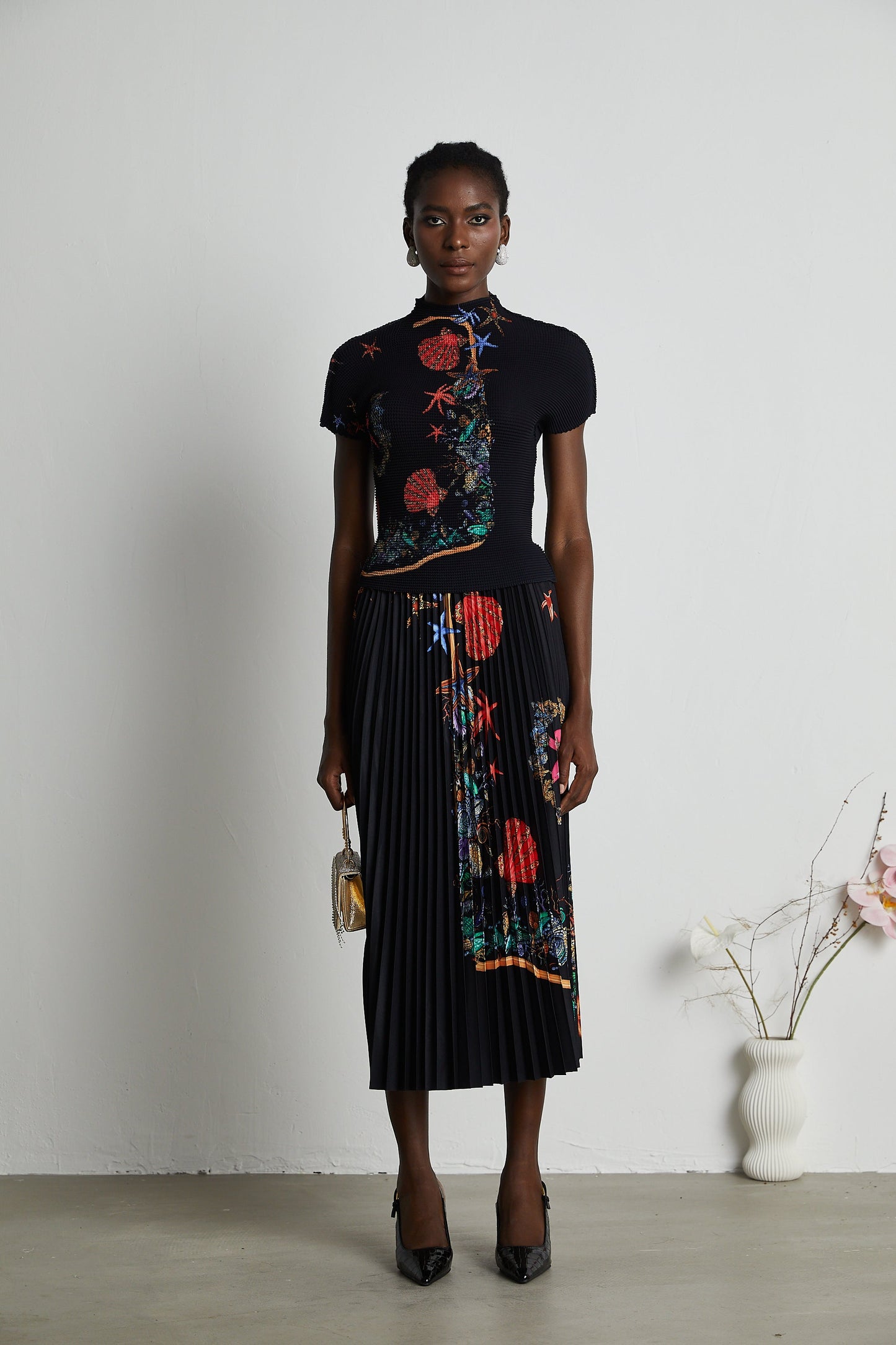 La Jardin Minuit — Printed knit top and pleated midi skirt