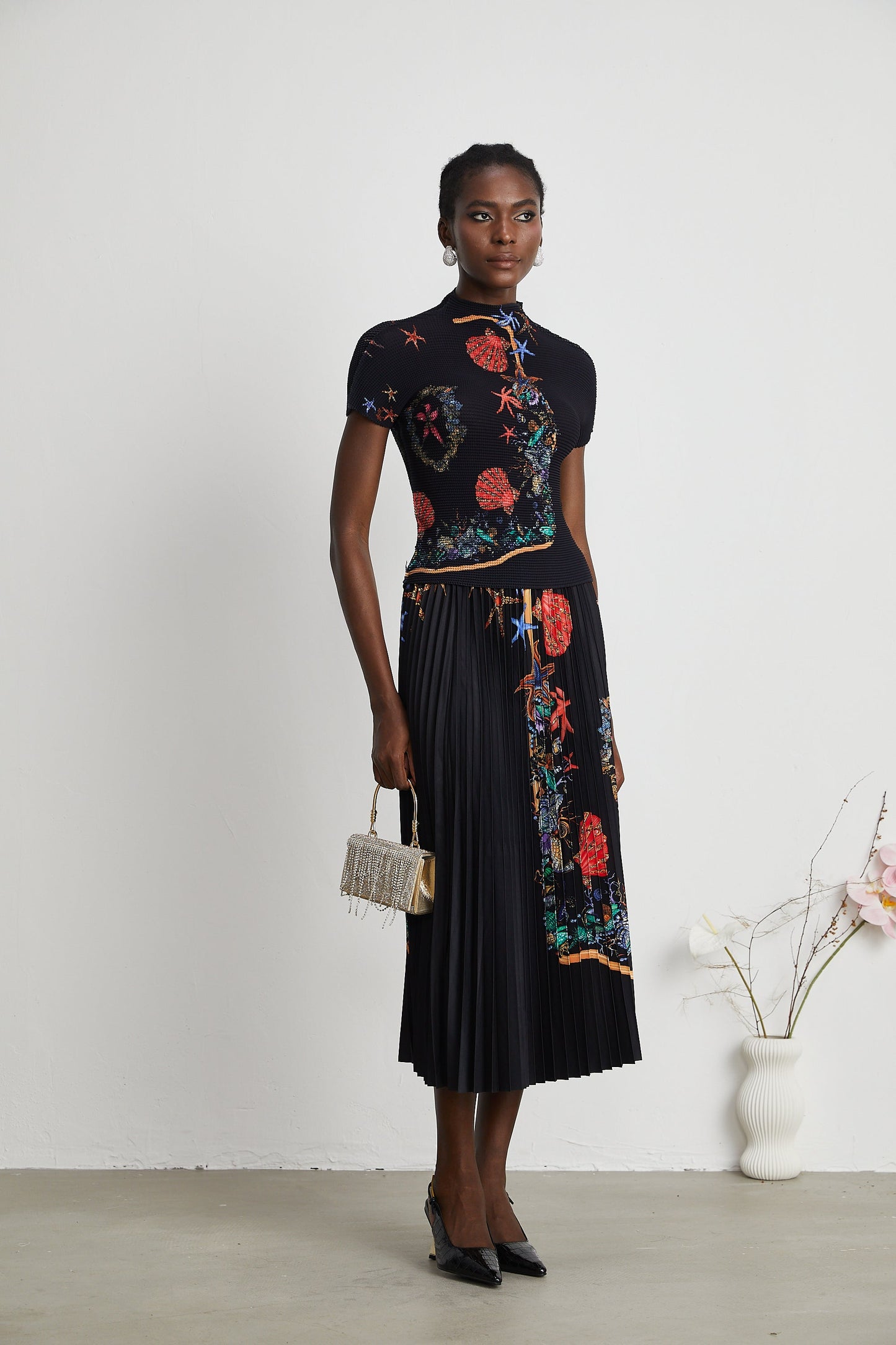 La Jardin Minuit — Printed knit top and pleated midi skirt