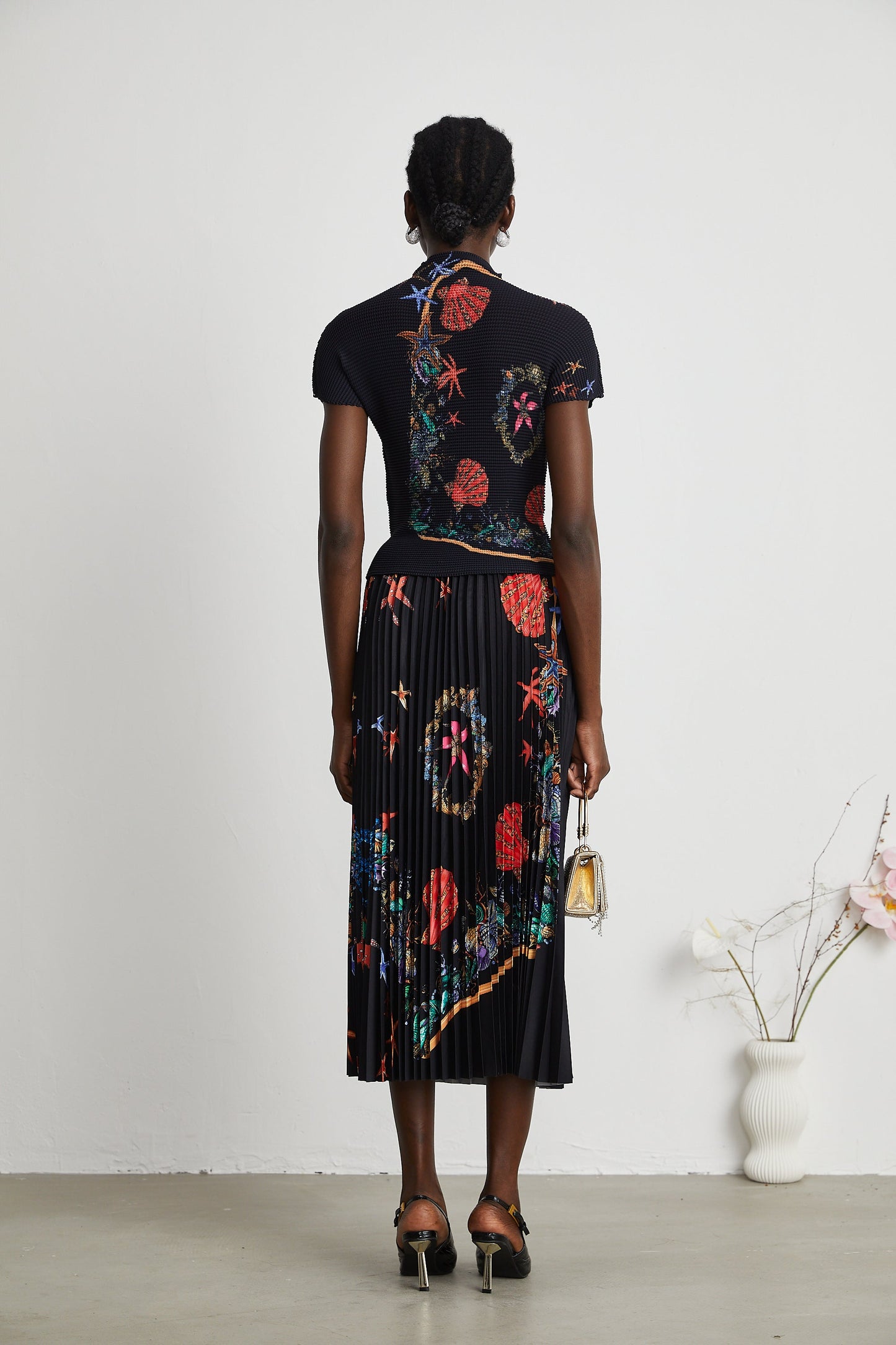 La Jardin Minuit — Printed knit top and pleated midi skirt
