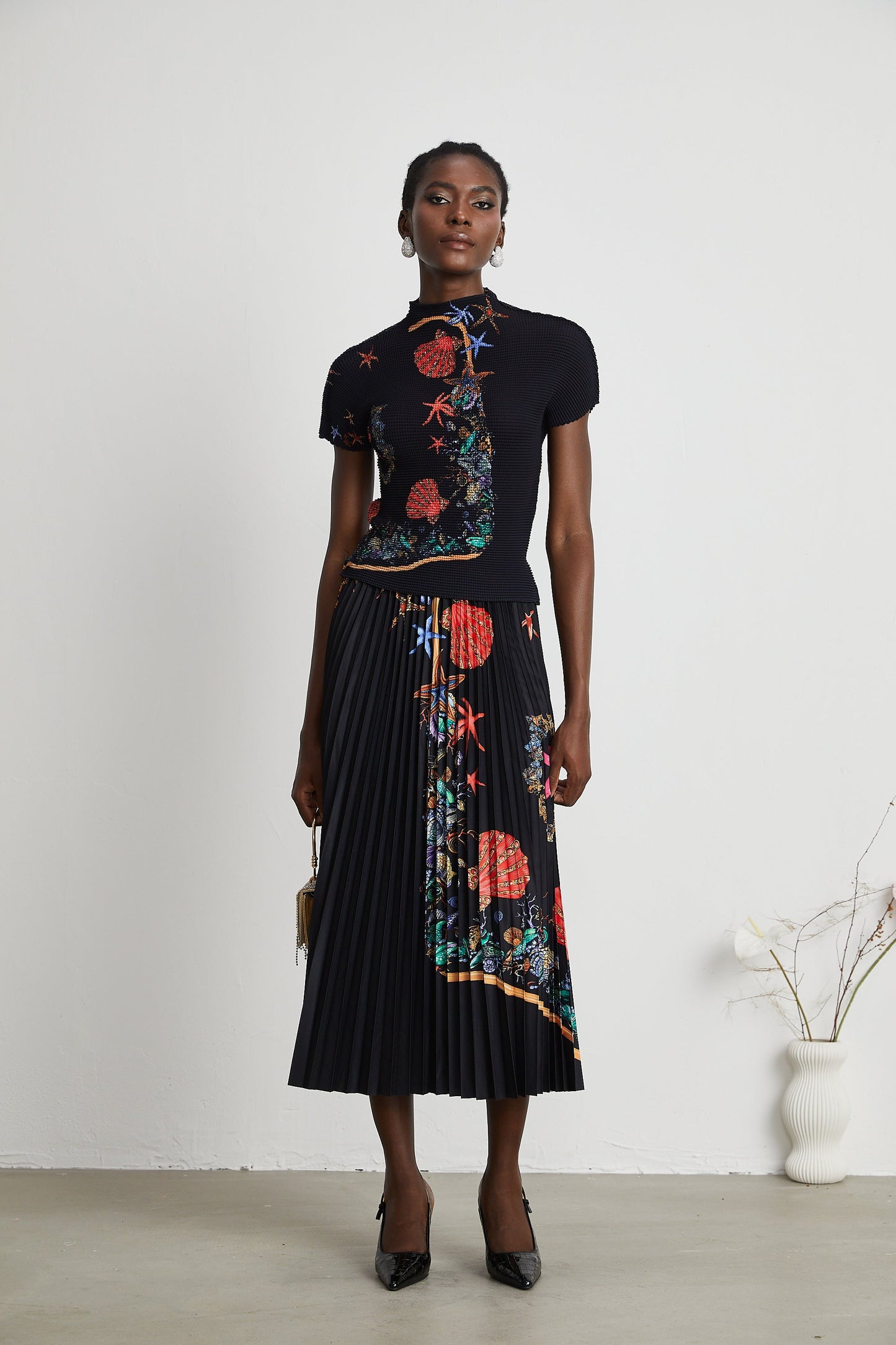 La Jardin Minuit — Printed knit top and pleated midi skirt