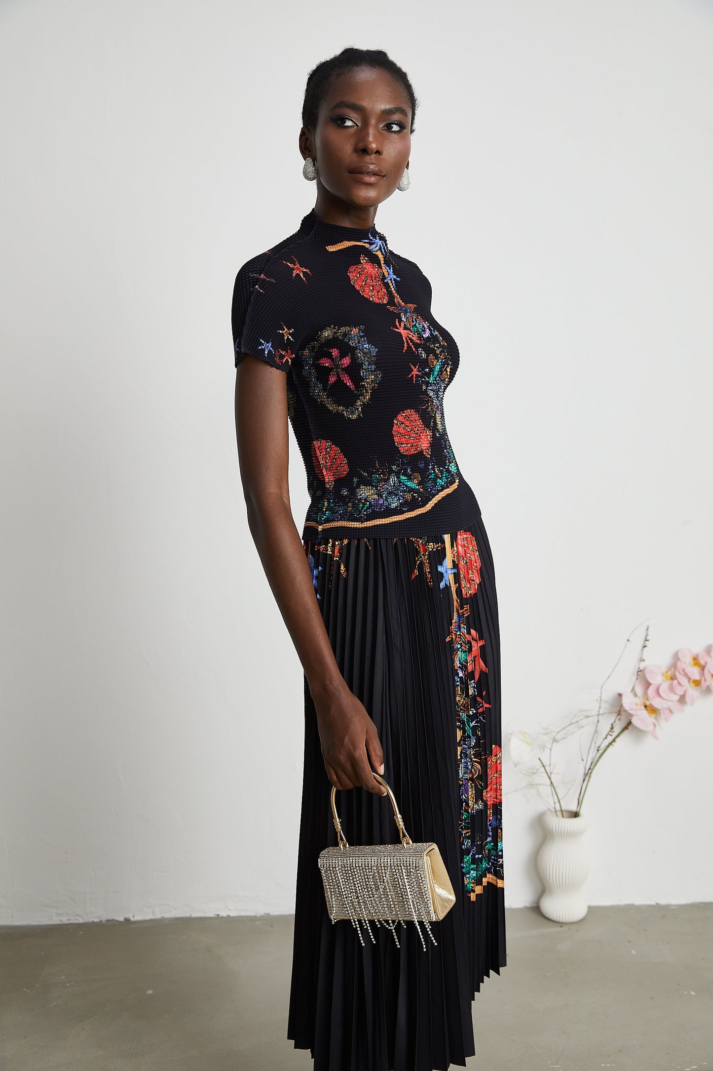 La Jardin Minuit — Printed knit top and pleated midi skirt