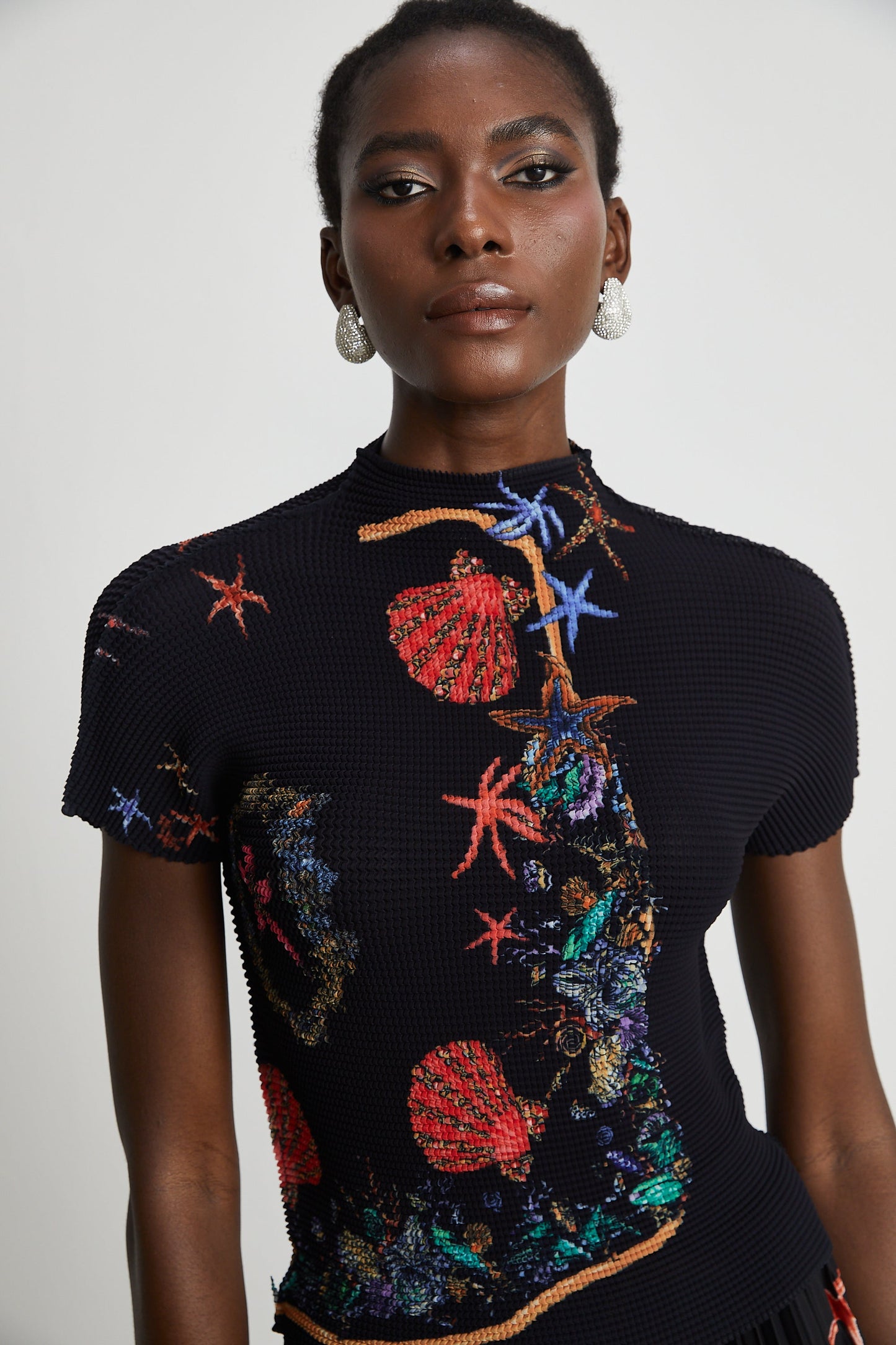 La Jardin Minuit — Printed knit top and pleated midi skirt