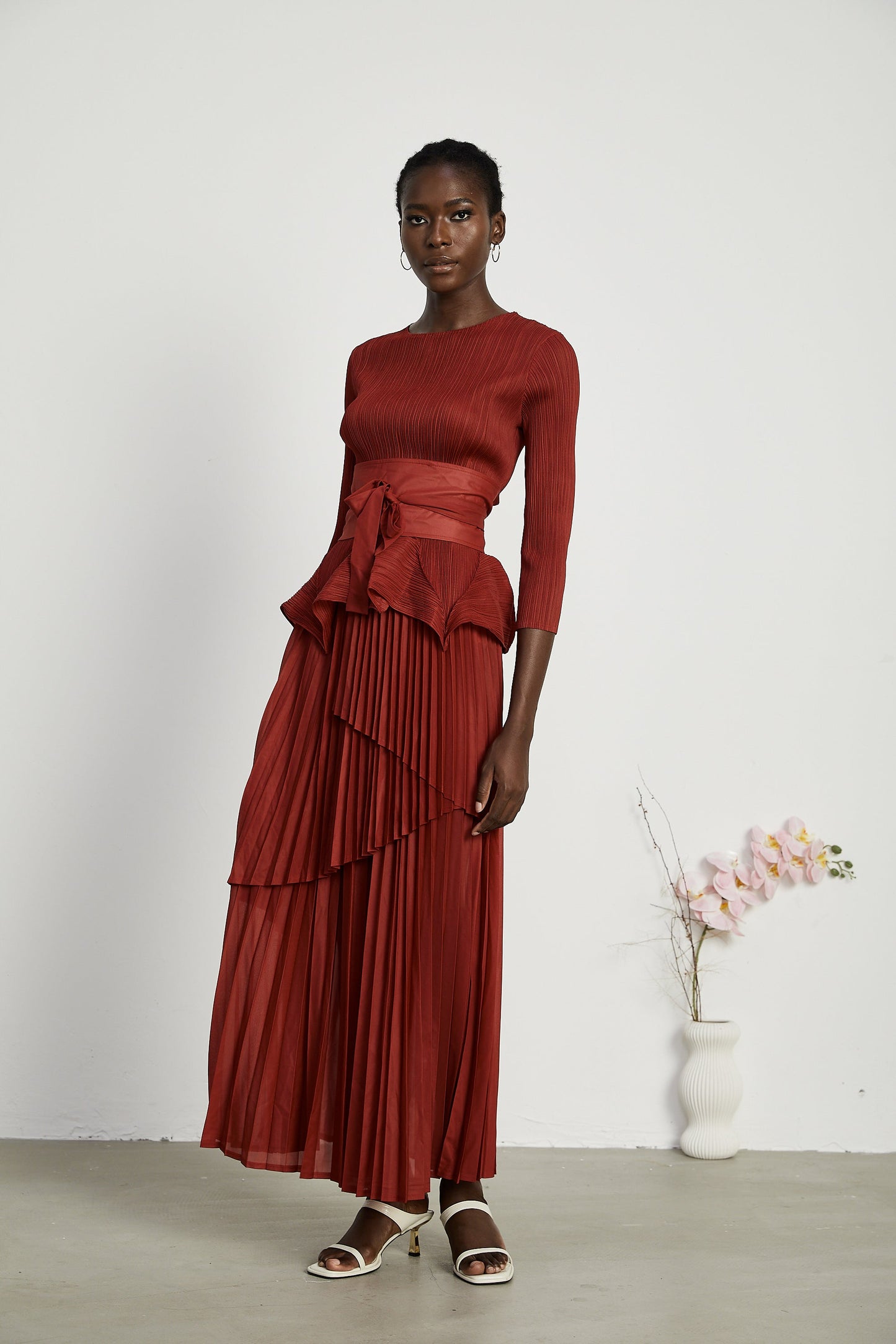 La Rouge Rythmée — Pleated bow-waist top and layered skirt