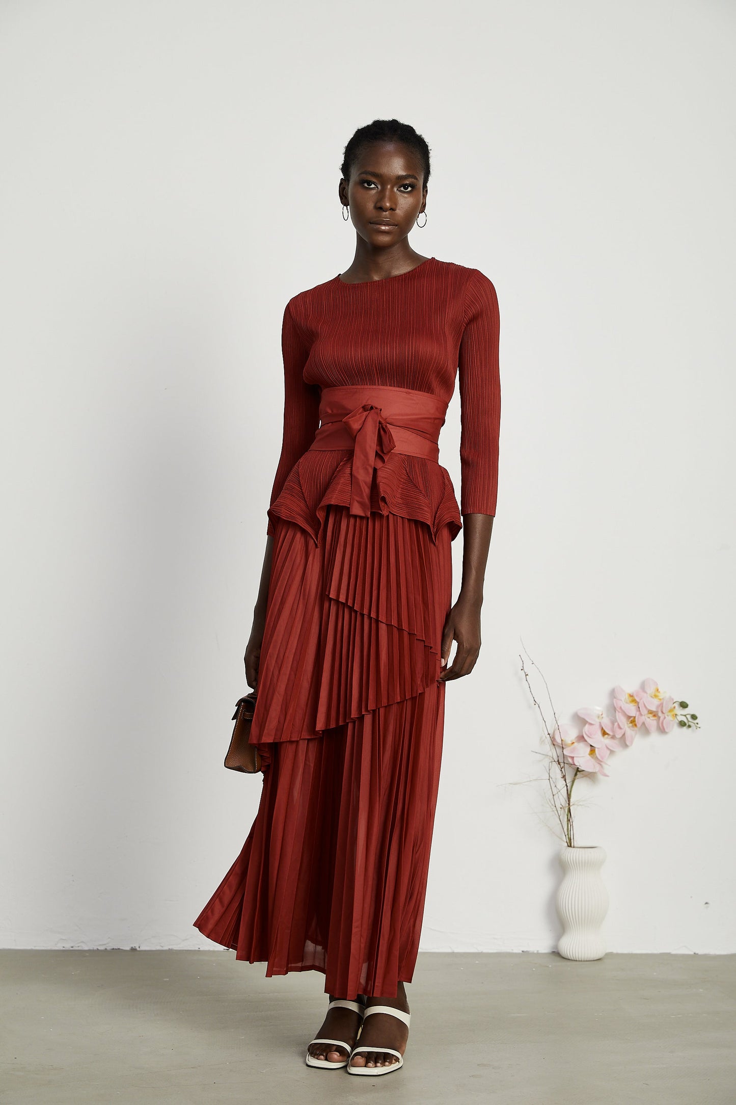 La Rouge Rythmée — Pleated bow-waist top and layered skirt