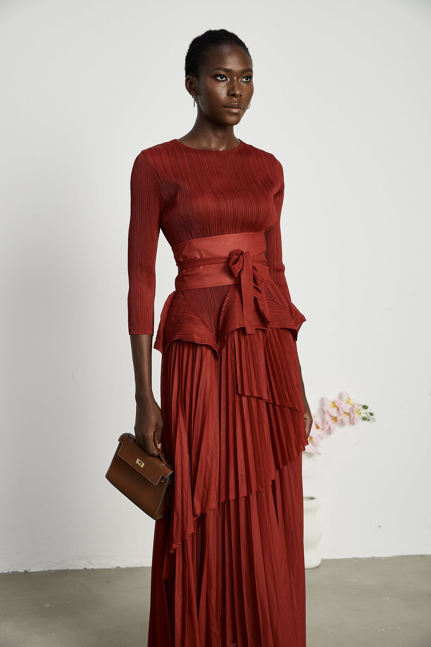 La Rouge Rythmée — Pleated bow-waist top and layered skirt