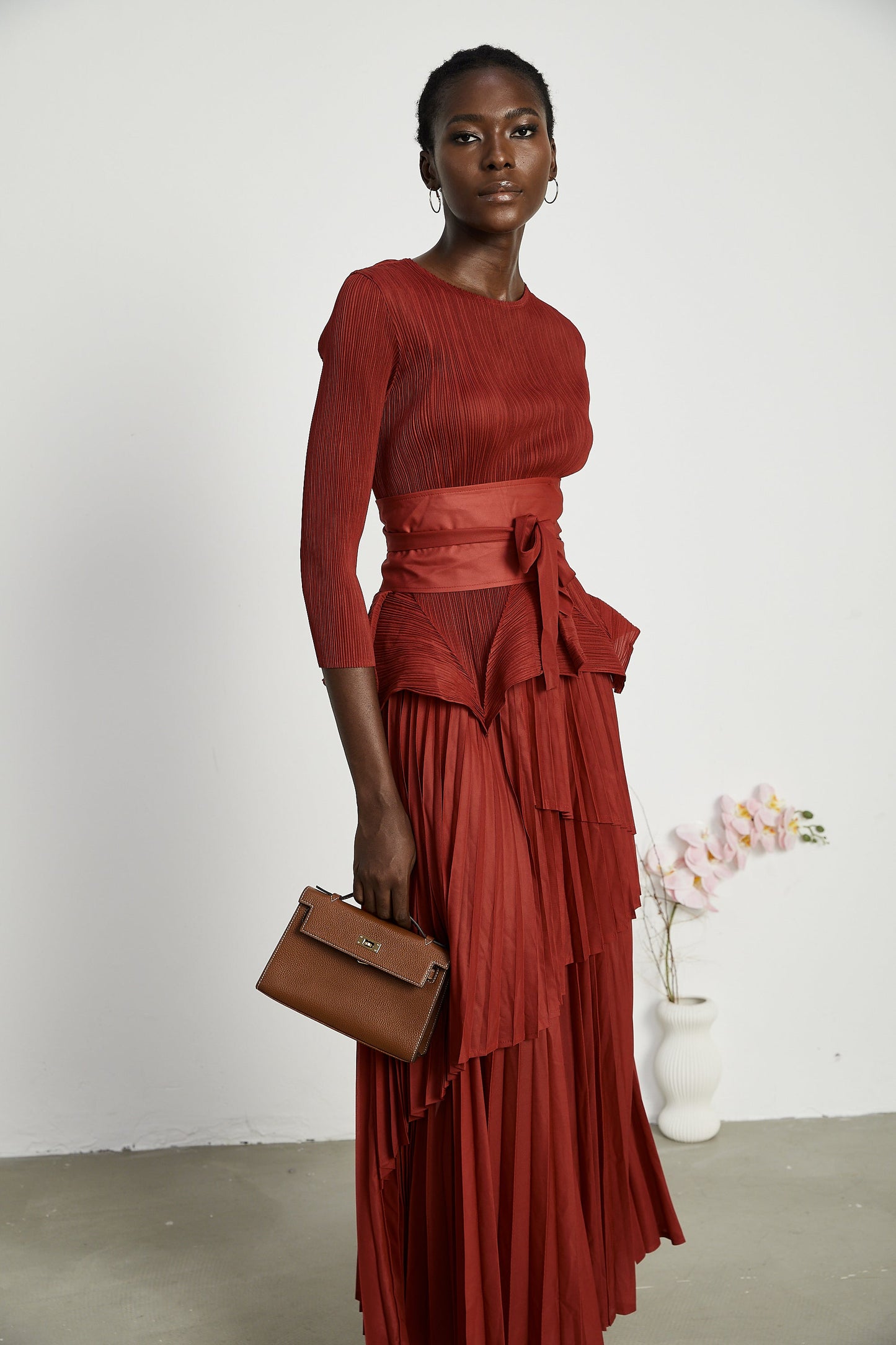 La Rouge Rythmée — Pleated bow-waist top and layered skirt