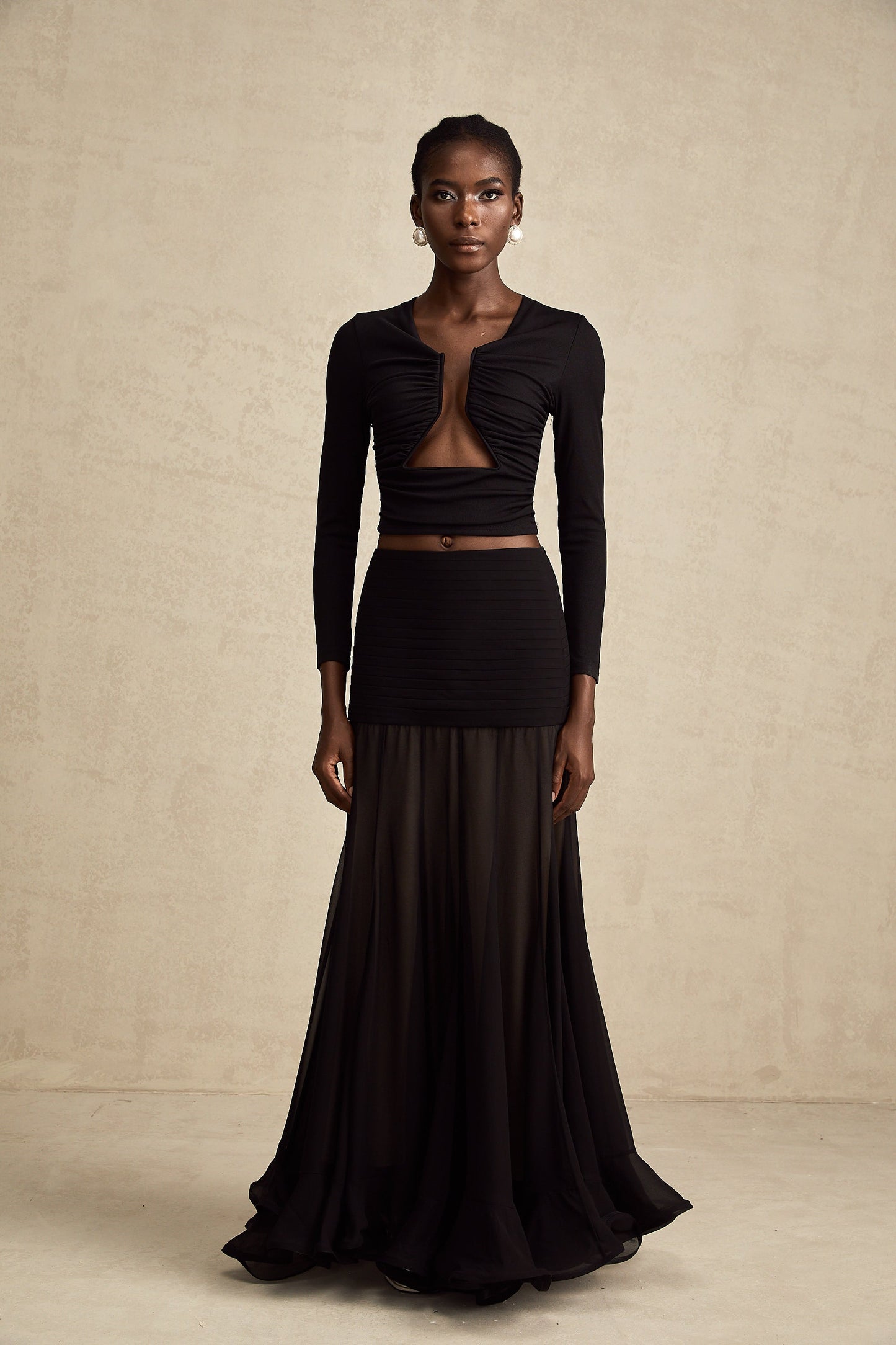 La Noir Drapée — Sculpted open-front top