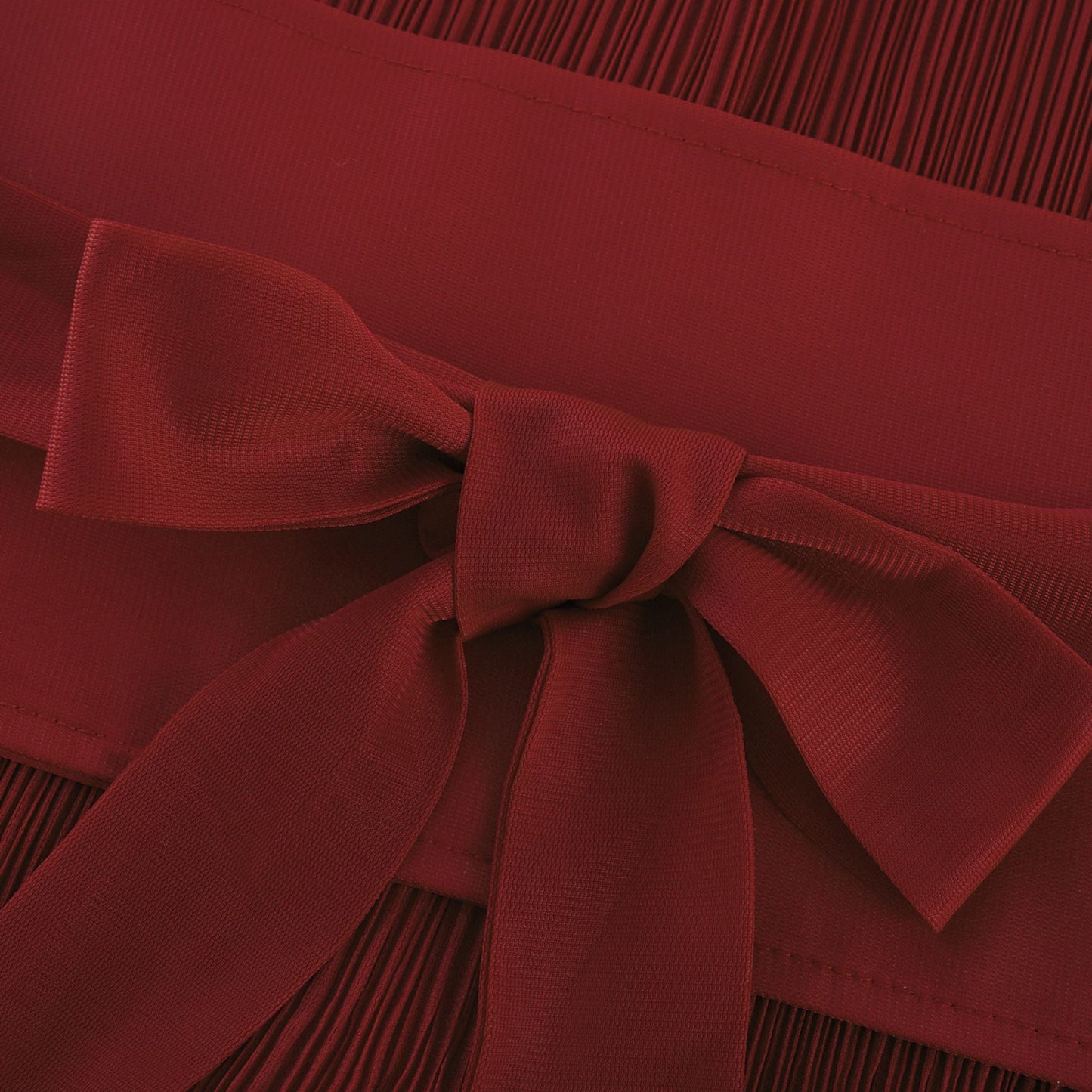 La Rouge Rythmée — Pleated bow-waist top and layered skirt