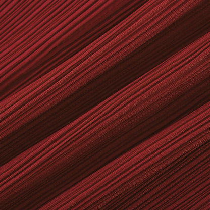 La Rouge Rythmée — Pleated bow-waist top and layered skirt