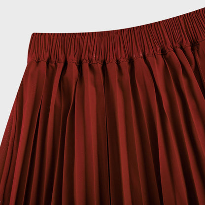 La Rouge Rythmée — Pleated bow-waist top and layered skirt