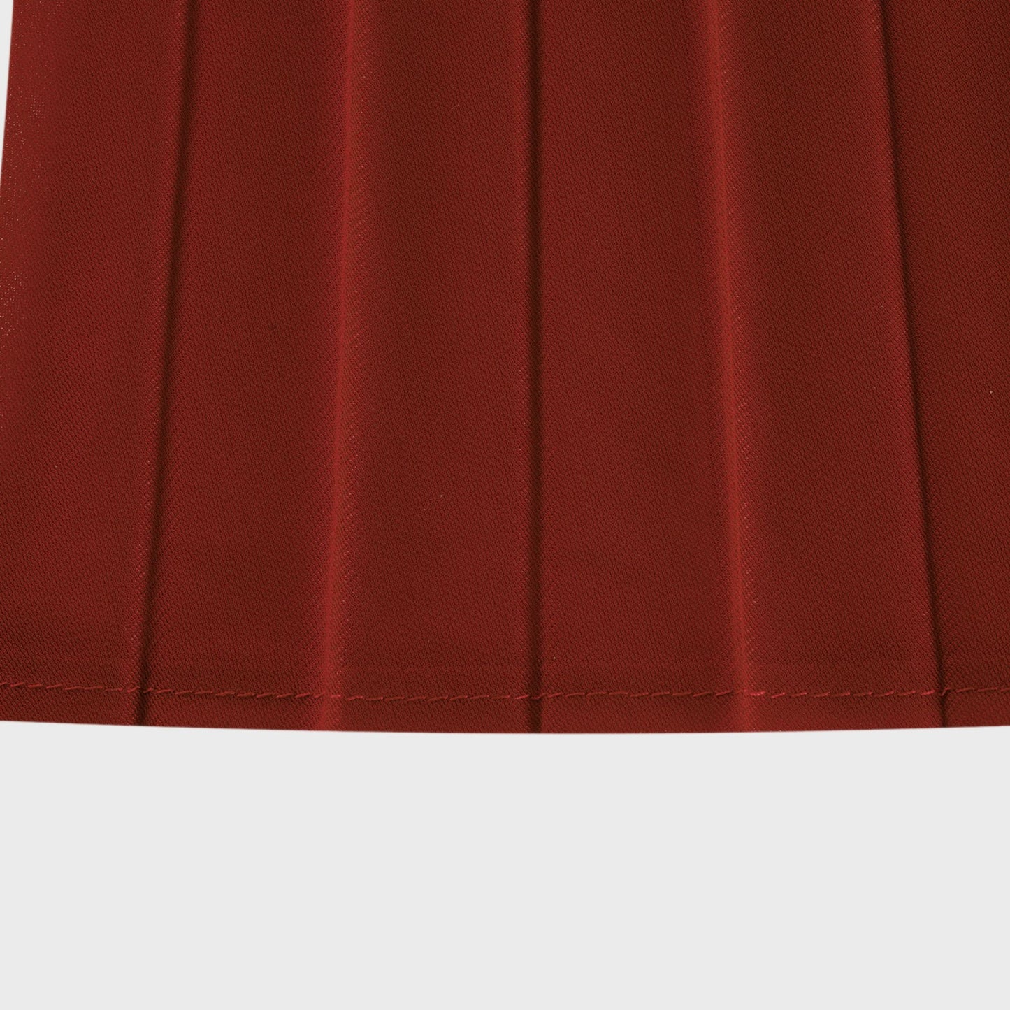 La Rouge Rythmée — Pleated bow-waist top and layered skirt