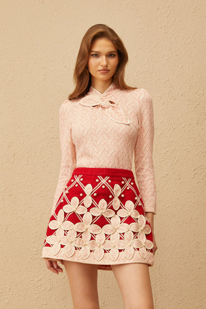 La Rosée — Bow-tie crochet blouse and petal mini skirt