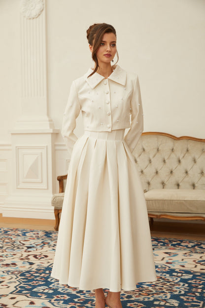 La Allure Blanche — Pearl-trim cropped jacket and pleated maxi skirt