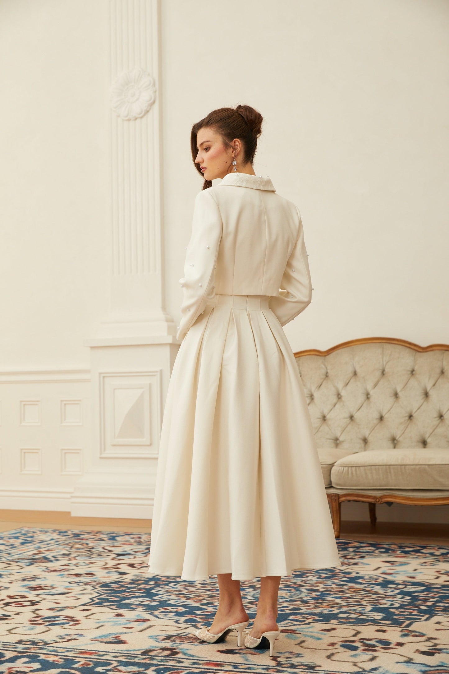 La Allure Blanche — Pearl-trim cropped jacket and pleated maxi skirt