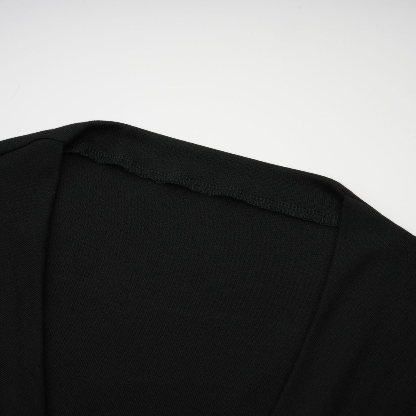 La Noir Drapée — Sculpted open-front top