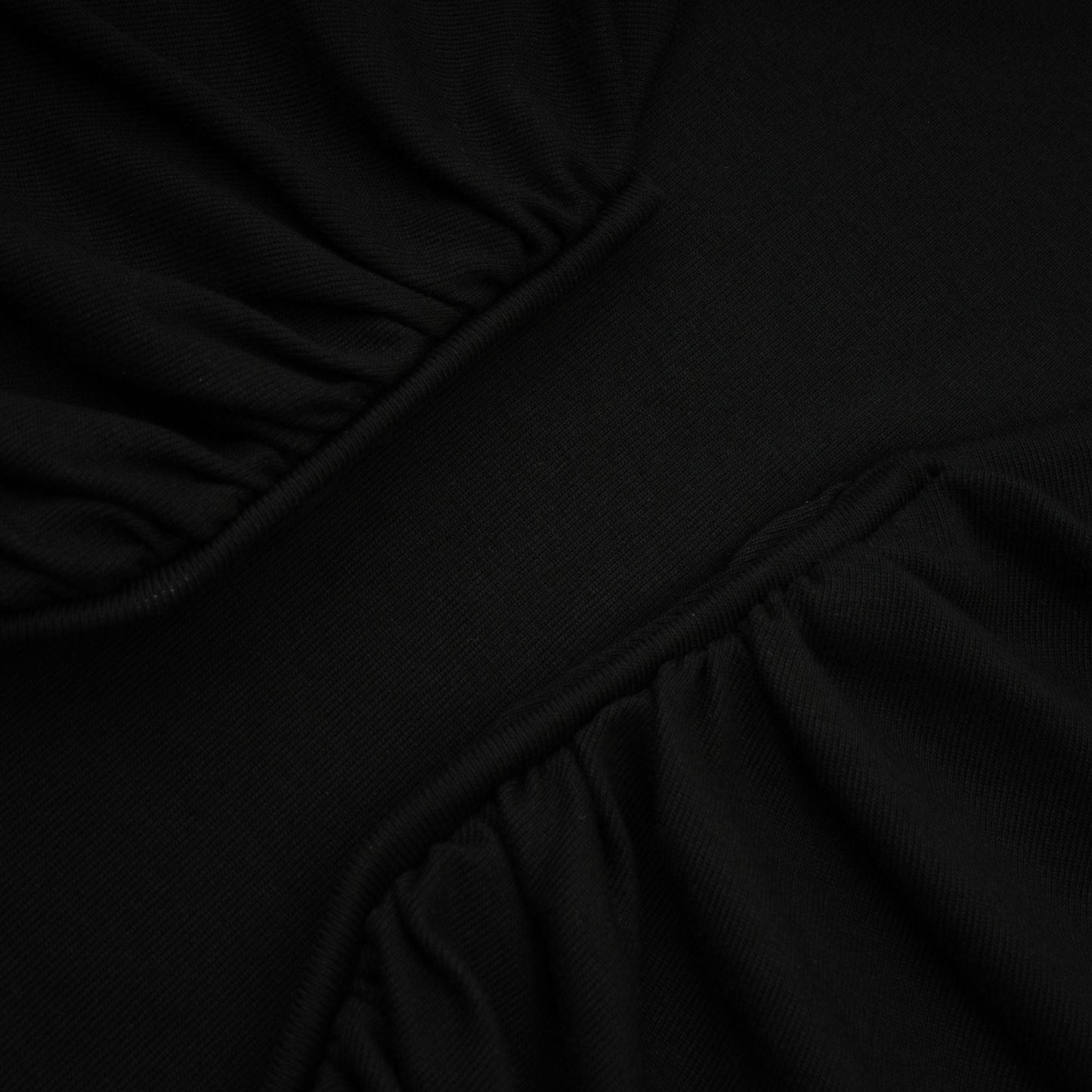 La Noir Drapée — Sculpted open-front top