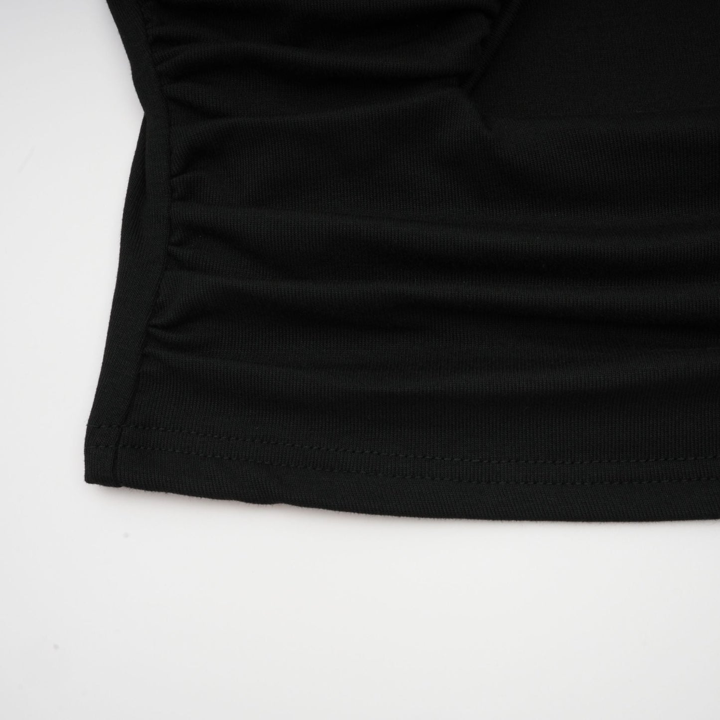 La Noir Drapée — Sculpted open-front top