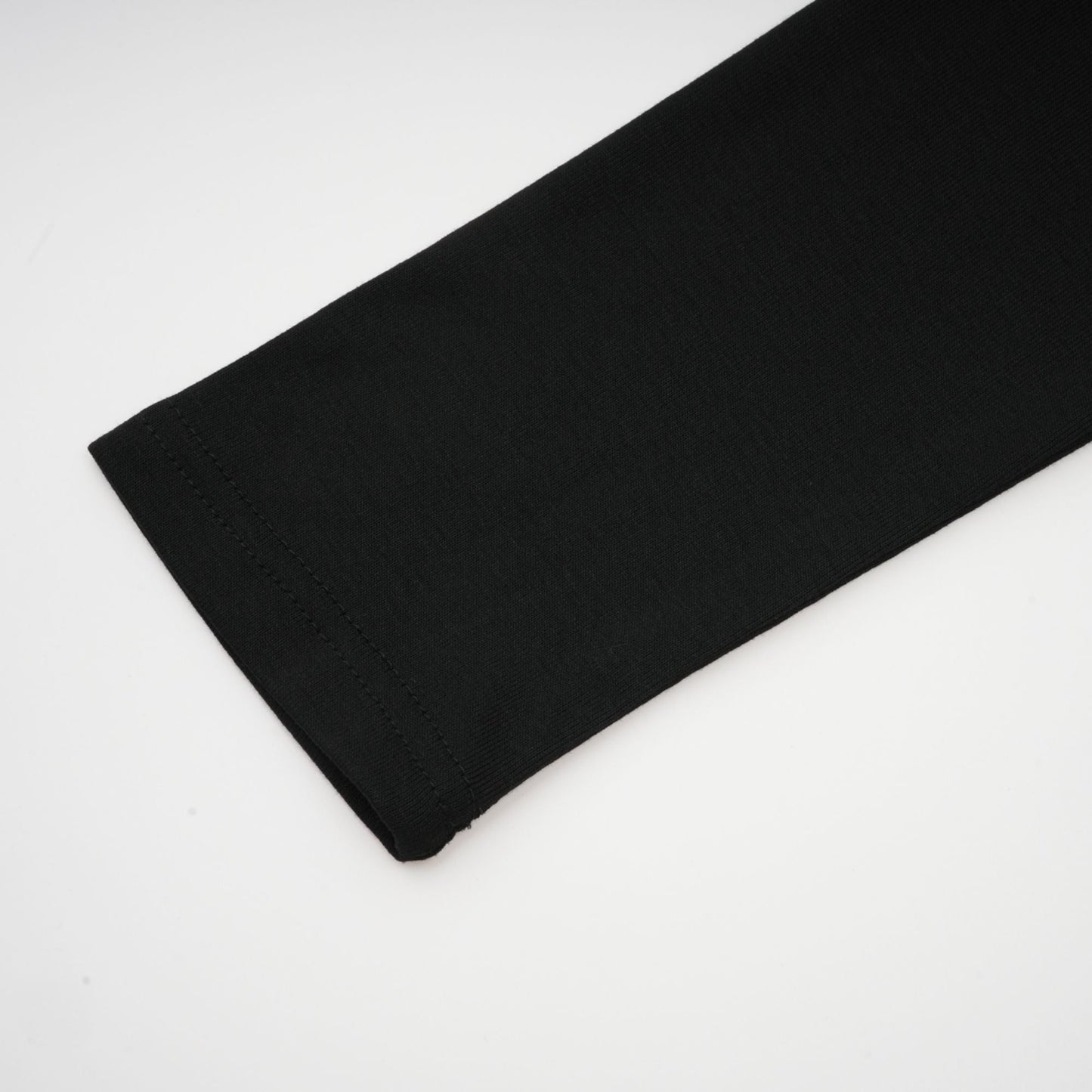 La Noir Drapée — Sculpted open-front top