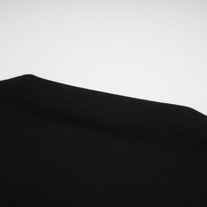 La Noir Drapée — Sculpted open-front top