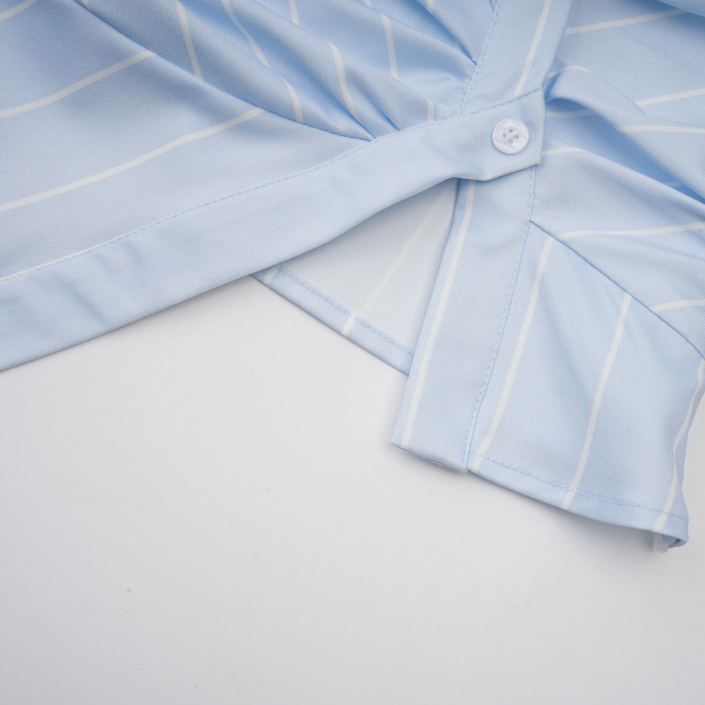 La Rayure Déstructurée — Off-shoulder striped cropped blouse