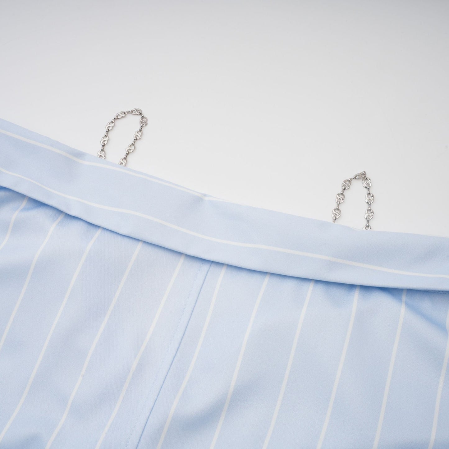 La Rayure Déstructurée — Off-shoulder striped cropped blouse