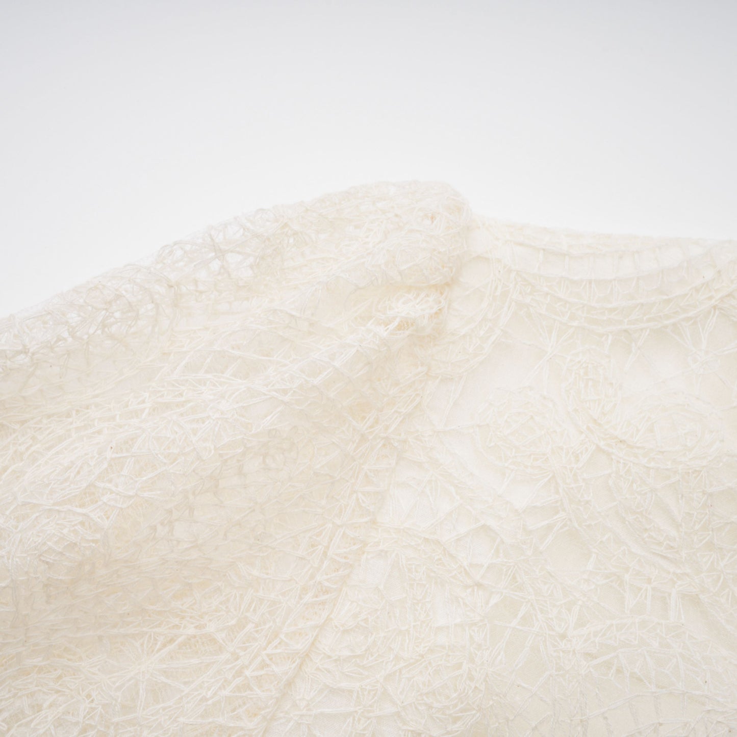 La Dentelle Claire — Embroidered lace blouse and mini skirt