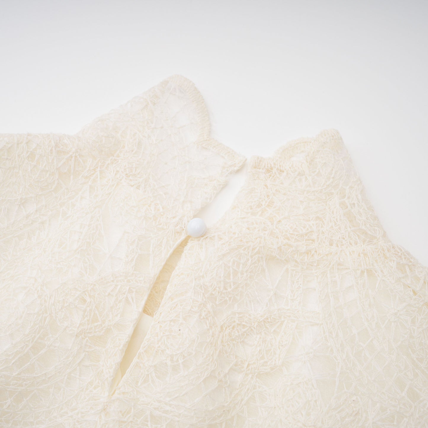 La Dentelle Claire — Embroidered lace blouse and mini skirt