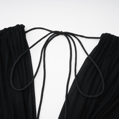 La Ligne Sculptée — Deep V twist-knot jumpsuit