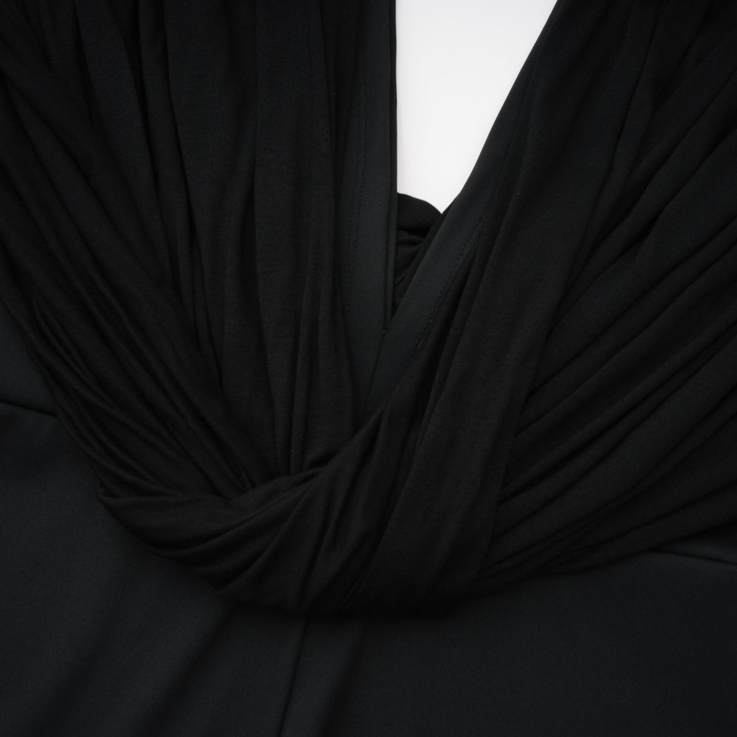 La Ligne Sculptée — Deep V twist-knot jumpsuit