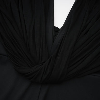 La Ligne Sculptée — Deep V twist-knot jumpsuit