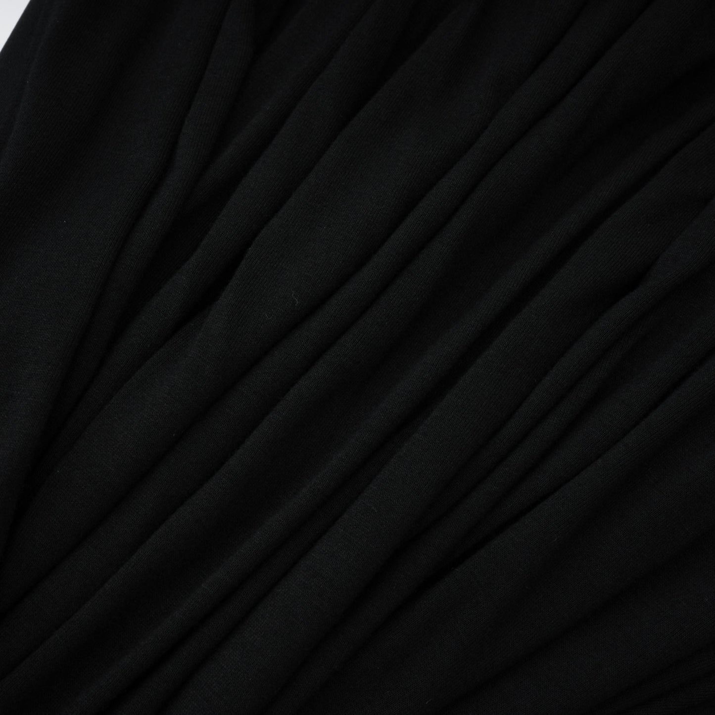 La Ligne Sculptée — Deep V twist-knot jumpsuit