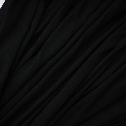 La Ligne Sculptée — Deep V twist-knot jumpsuit