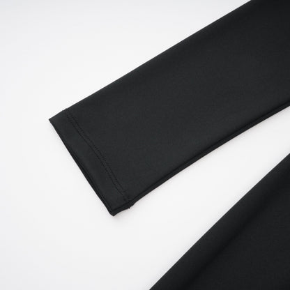 La Ligne Sculptée — Deep V twist-knot jumpsuit