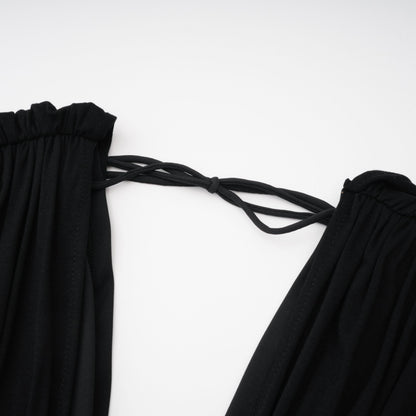 La Ligne Sculptée — Deep V twist-knot jumpsuit