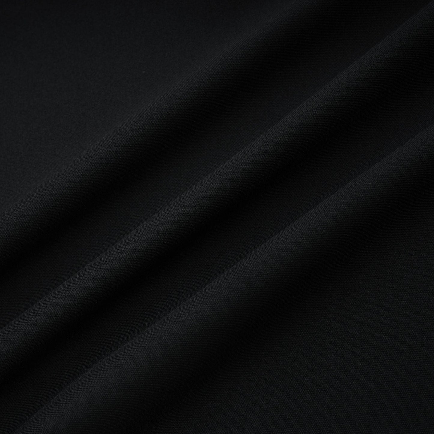 La Ligne Sculptée — Deep V twist-knot jumpsuit