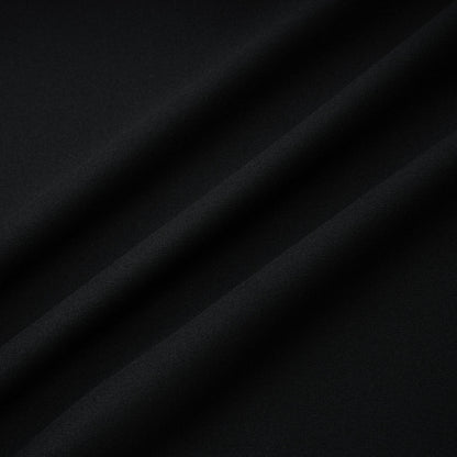 La Ligne Sculptée — Deep V twist-knot jumpsuit