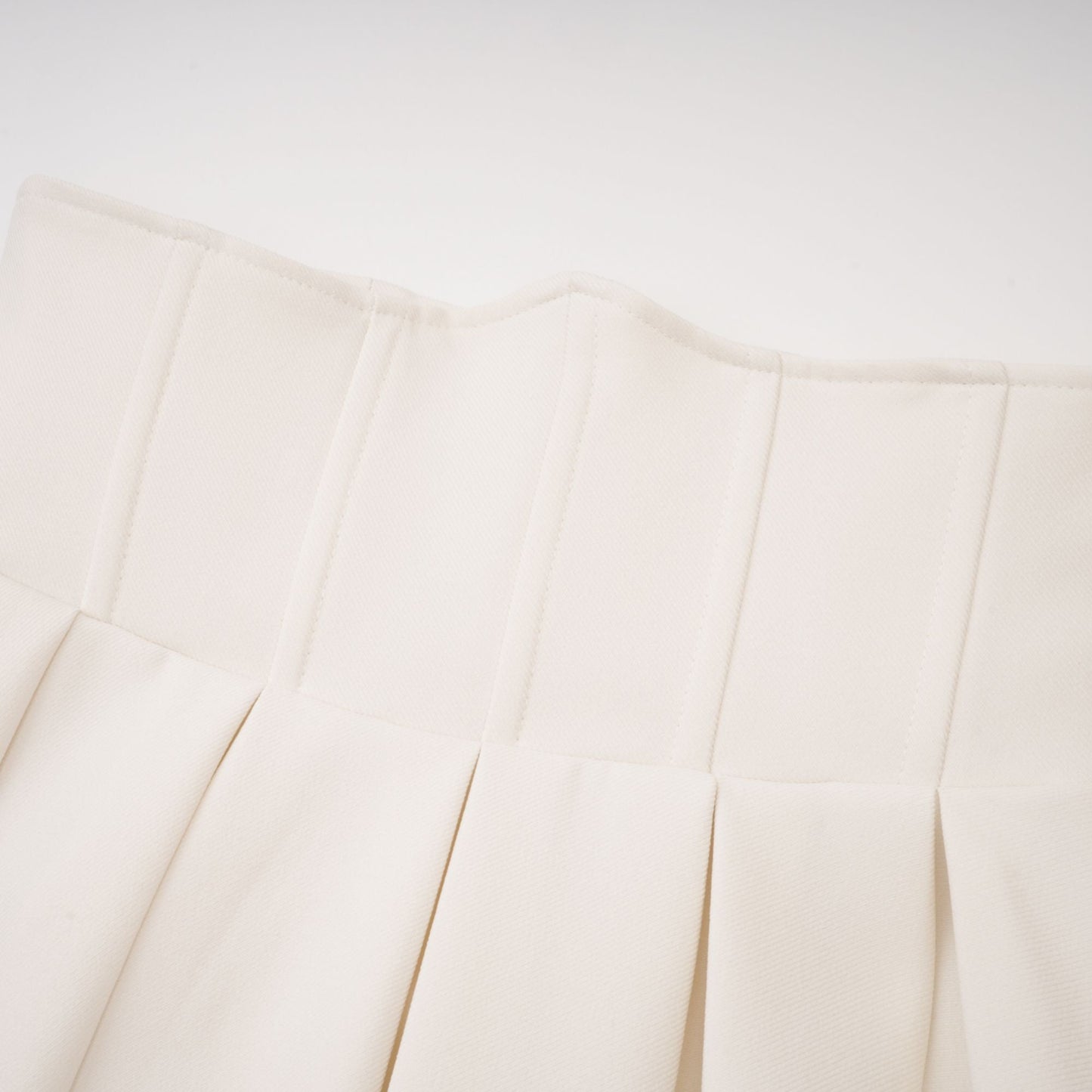 La Allure Blanche — Pearl-trim cropped jacket and pleated maxi skirt