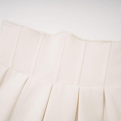 La Allure Blanche — Pearl-trim cropped jacket and pleated maxi skirt