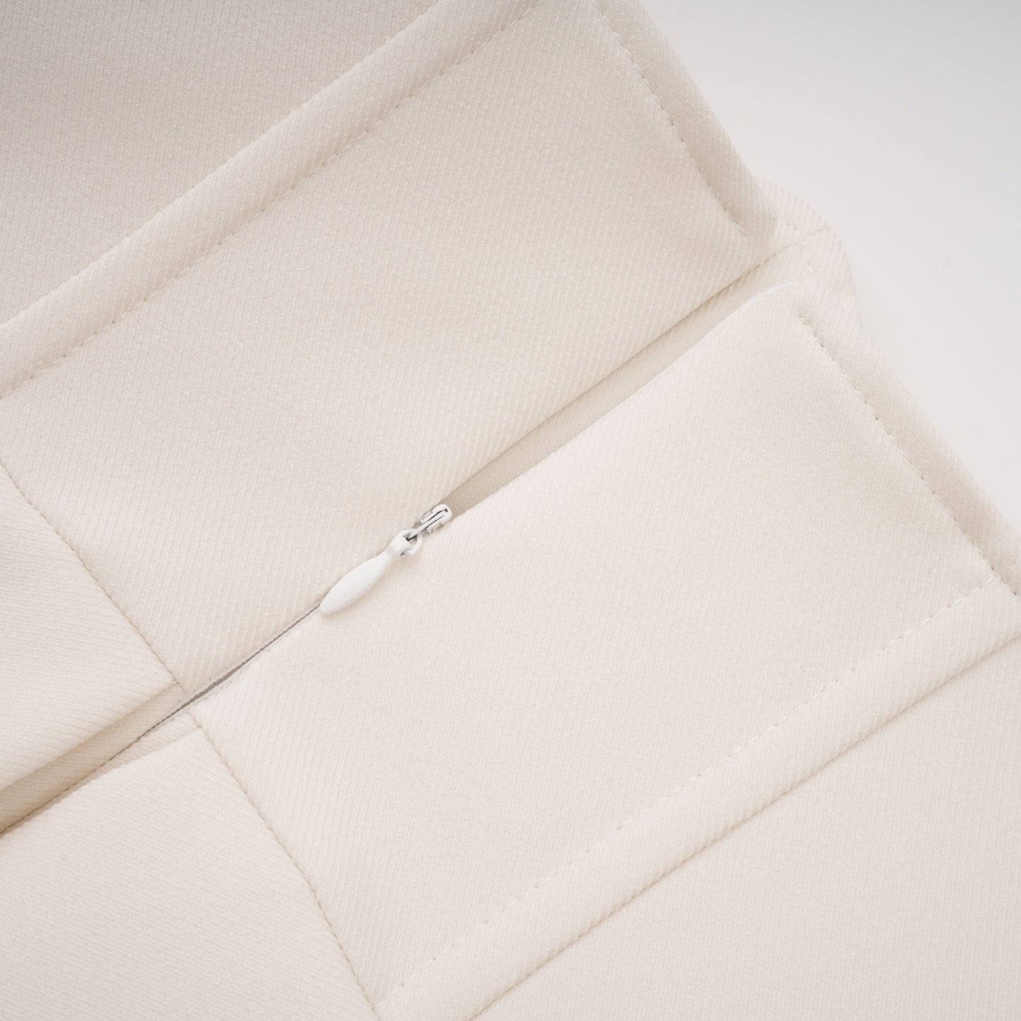 La Allure Blanche — Pearl-trim cropped jacket and pleated maxi skirt