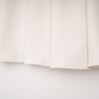 La Allure Blanche — Pearl-trim cropped jacket and pleated maxi skirt