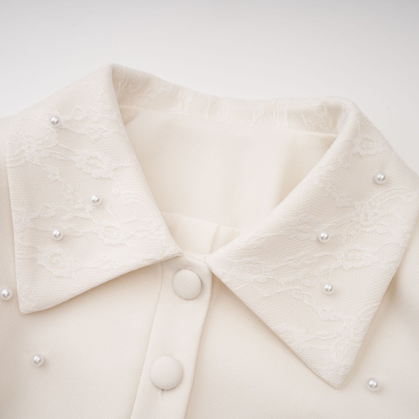 La Allure Blanche — Pearl-trim cropped jacket and pleated maxi skirt