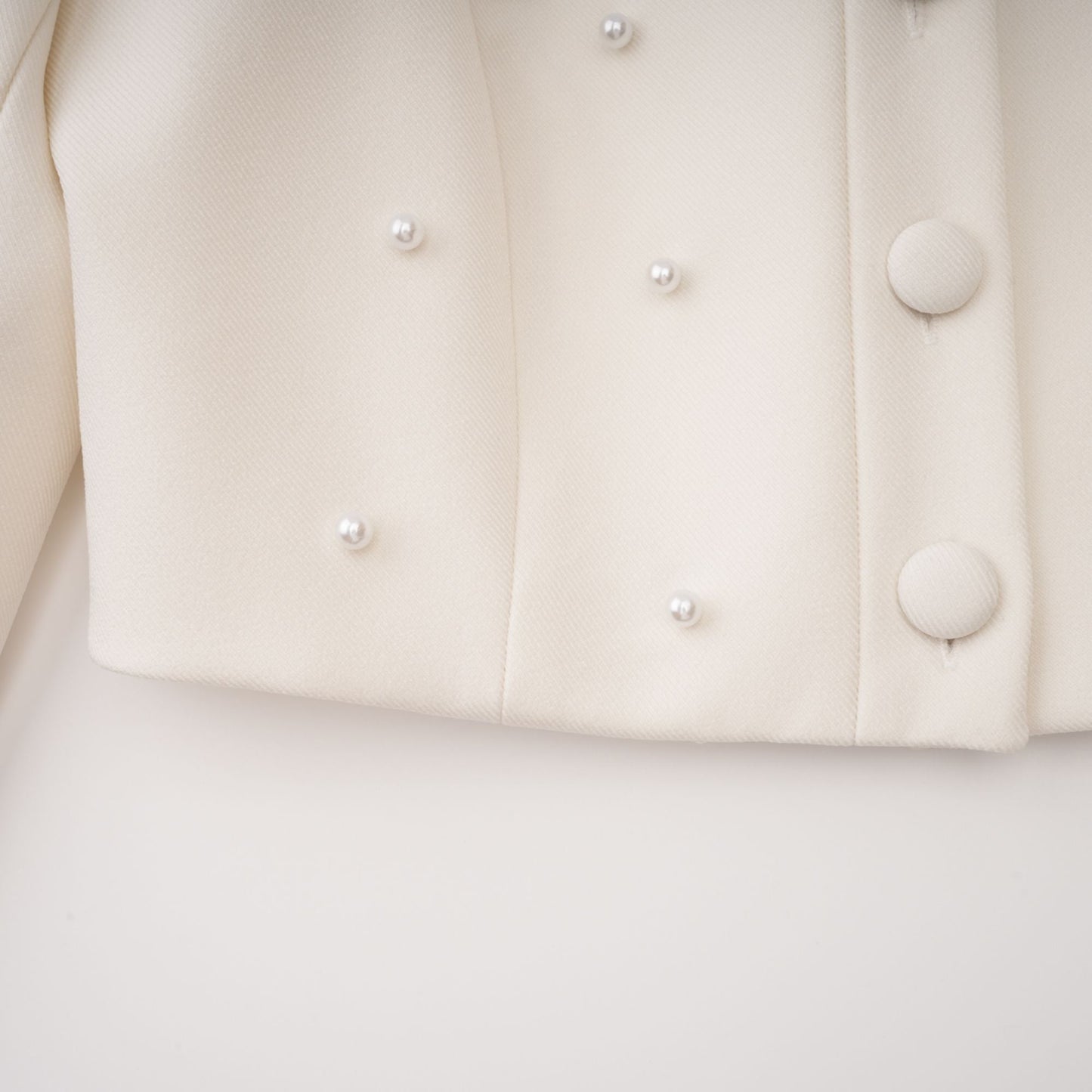 La Allure Blanche — Pearl-trim cropped jacket and pleated maxi skirt