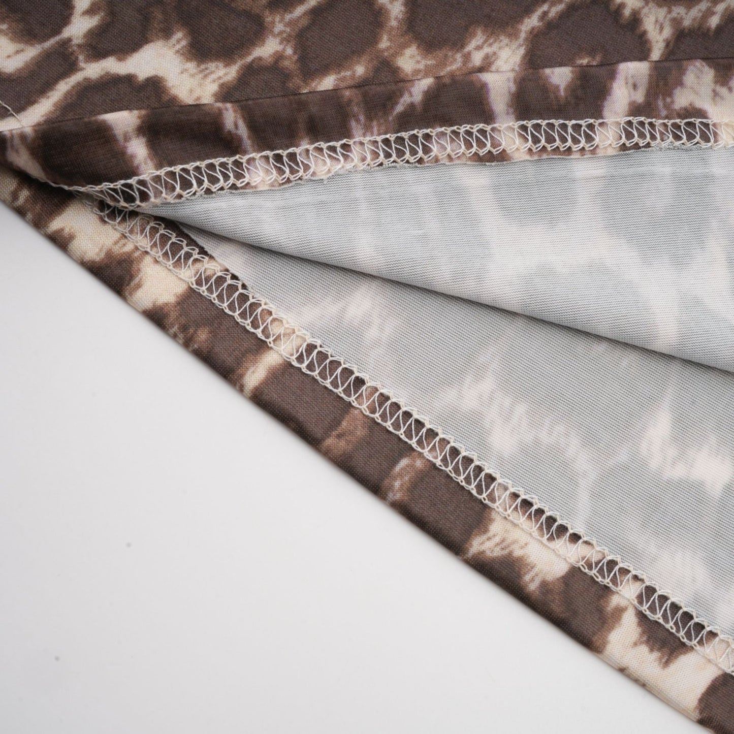 La Fauve — Leopard silk-touch blouse with scarf tie