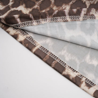 La Fauve — Leopard silk-touch blouse with scarf tie