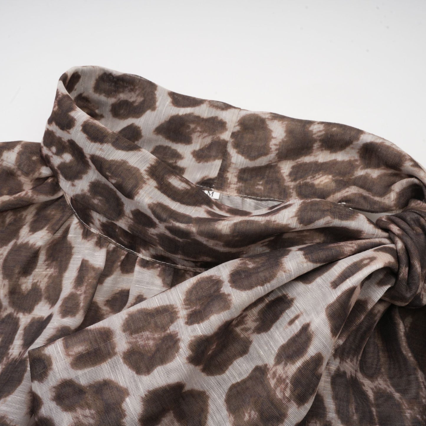La Fauve — Leopard silk-touch blouse with scarf tie