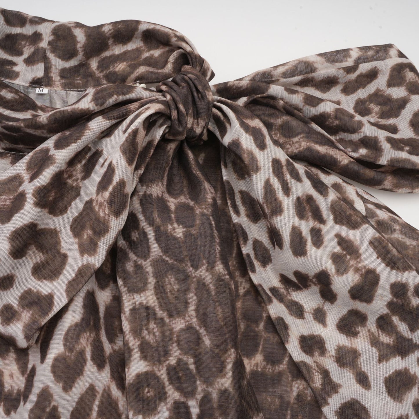 La Fauve — Leopard silk-touch blouse with scarf tie