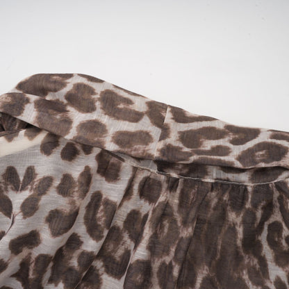 La Fauve — Leopard silk-touch blouse with scarf tie