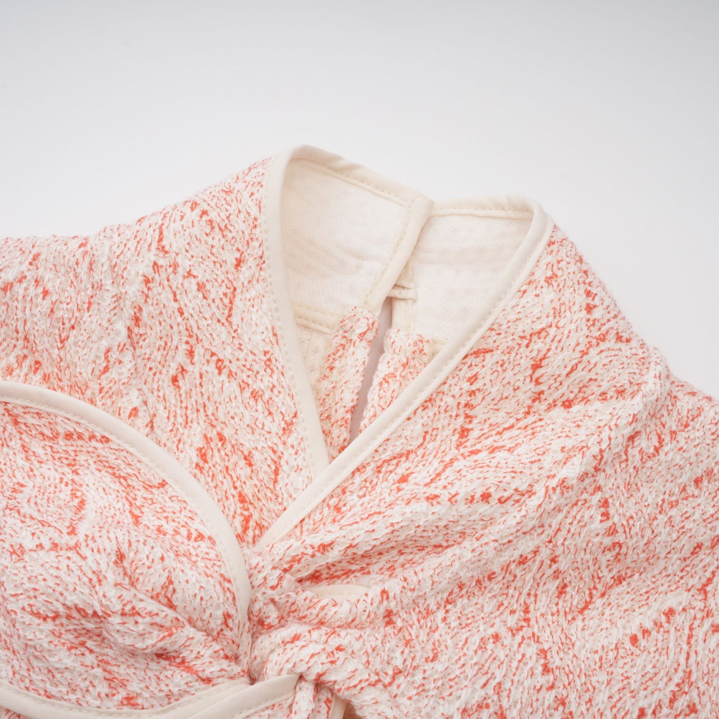 La Rosée — Bow-tie crochet blouse and petal mini skirt