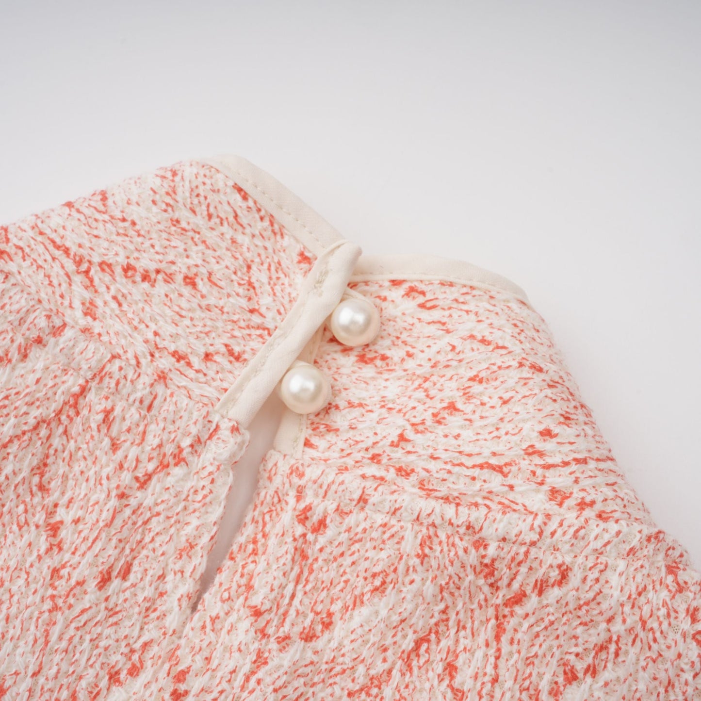 La Rosée — Bow-tie crochet blouse and petal mini skirt