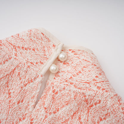 La Rosée — Bow-tie crochet blouse and petal mini skirt
